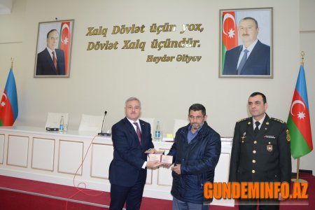 Tərtərdə şahid ailələri və qazilərə orden və medallar təqdim edildi 